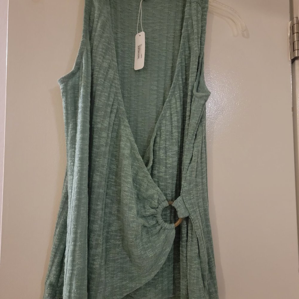 Sleeveless green blouse